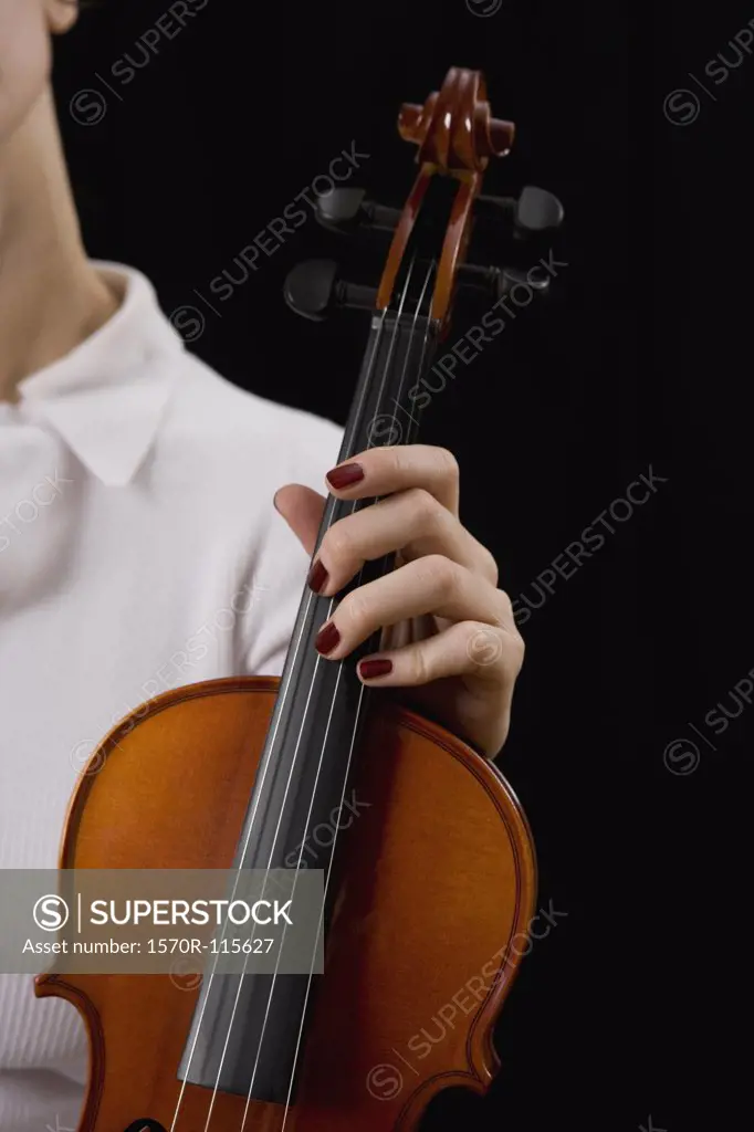 Woman holding a violin