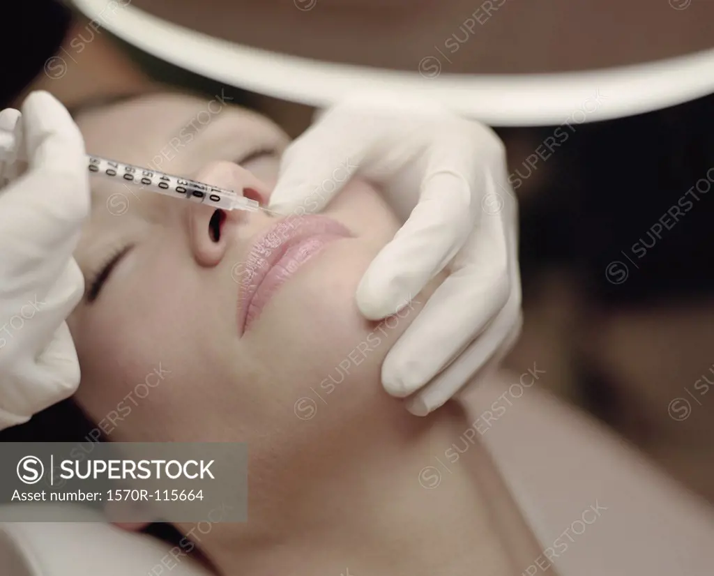 Woman receiving a Botox injection
