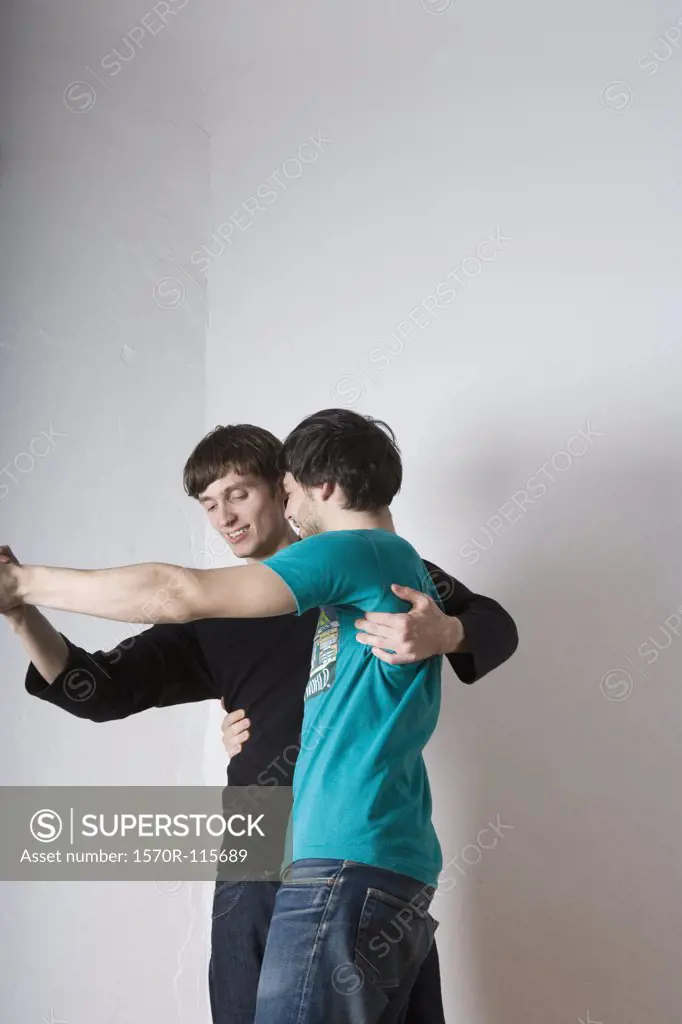 Two young men dancing