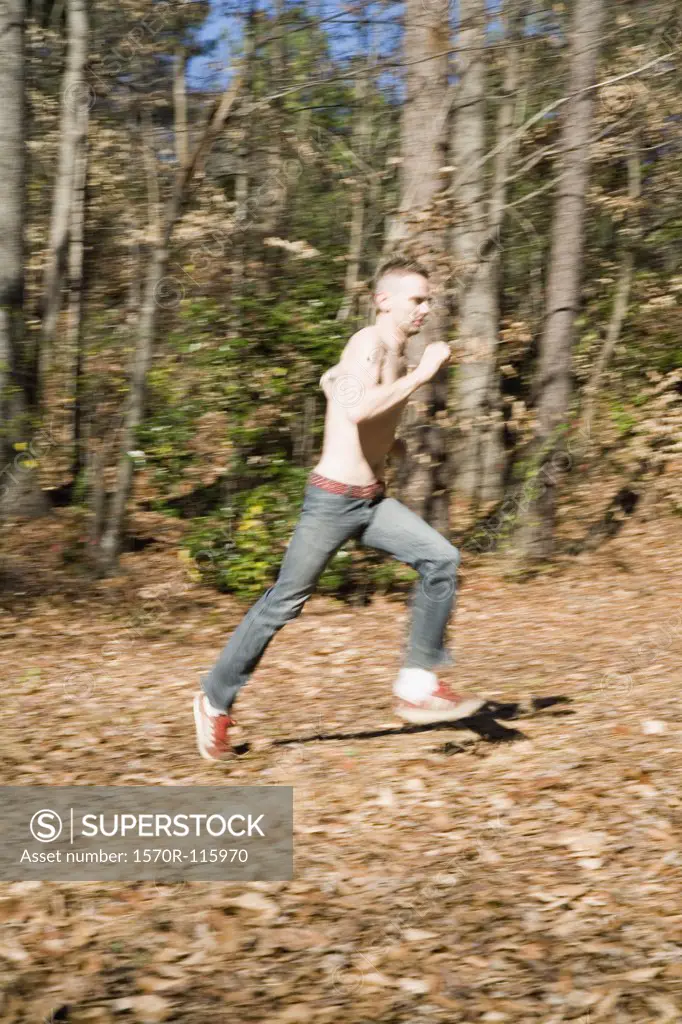 Man running through the woods