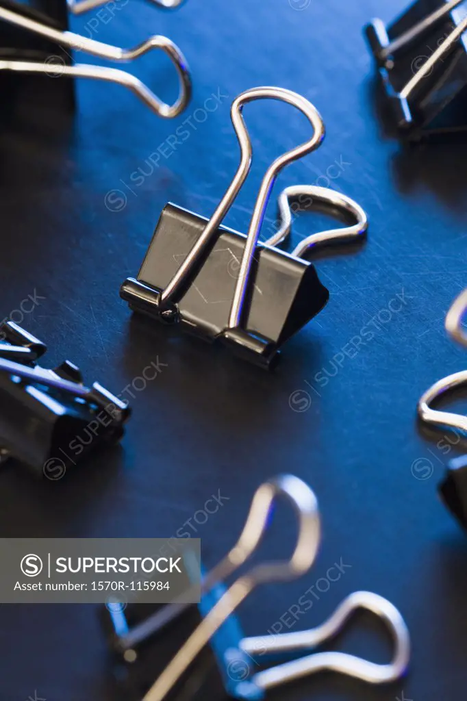 Binder clips on a desk