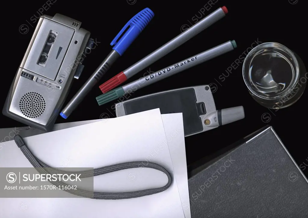 Dictaphone, mobile phone, and other office supplies