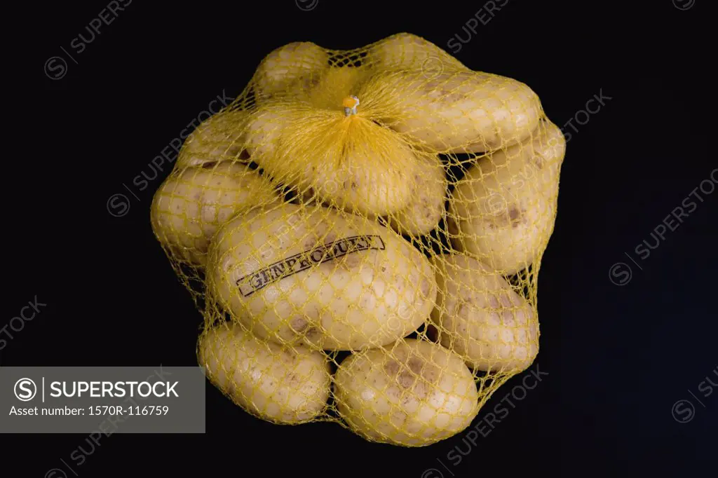 A sack of potatoes stamped 'Genetic Product'