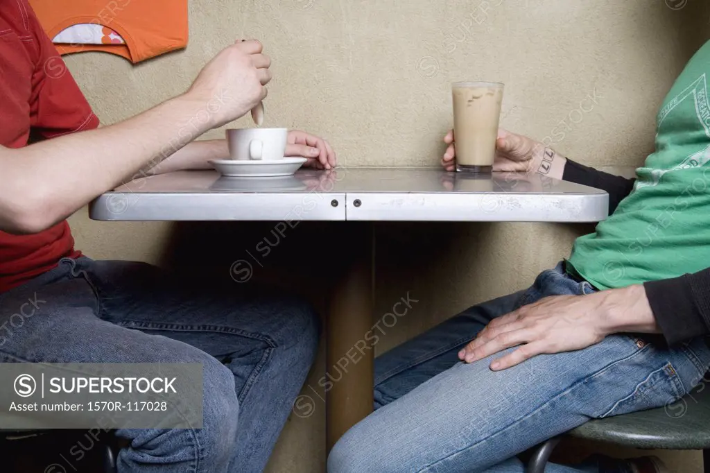 Two people sitting in a cafe
