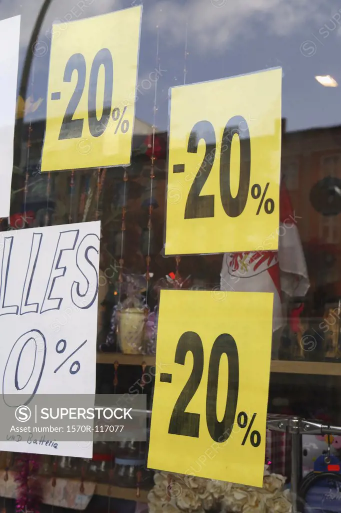 Sale signs in a store window