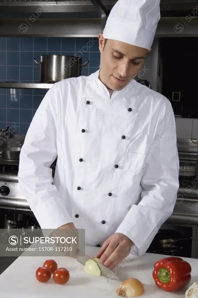 A chef preparing vegetables