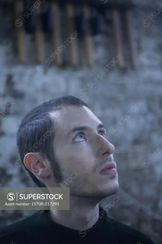 A young man looking up