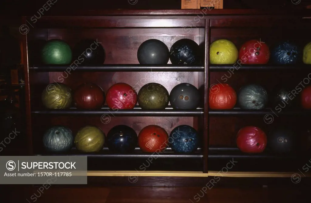 Bowling balls on a shelf
