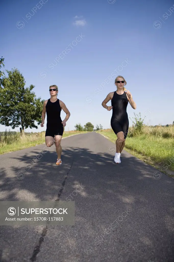 Two woman running