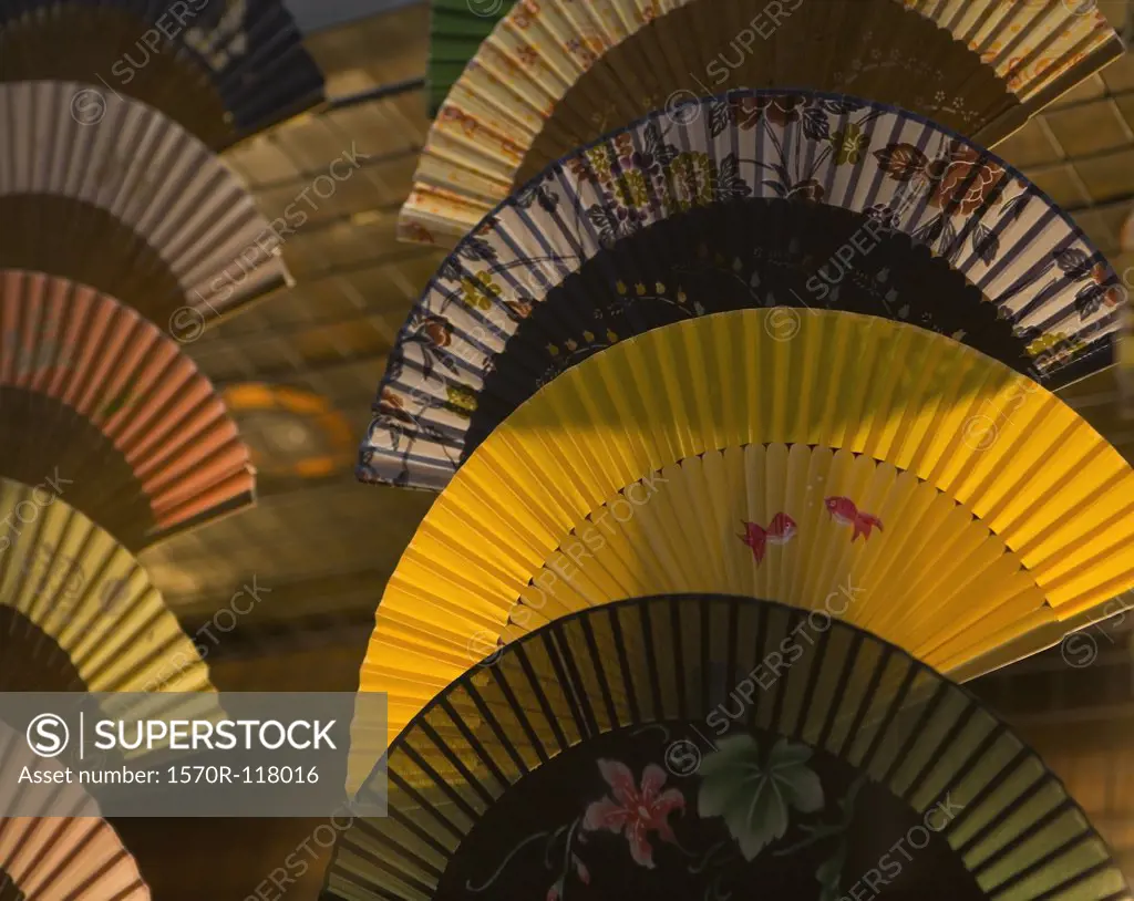 Japanese folding fans at sunset
