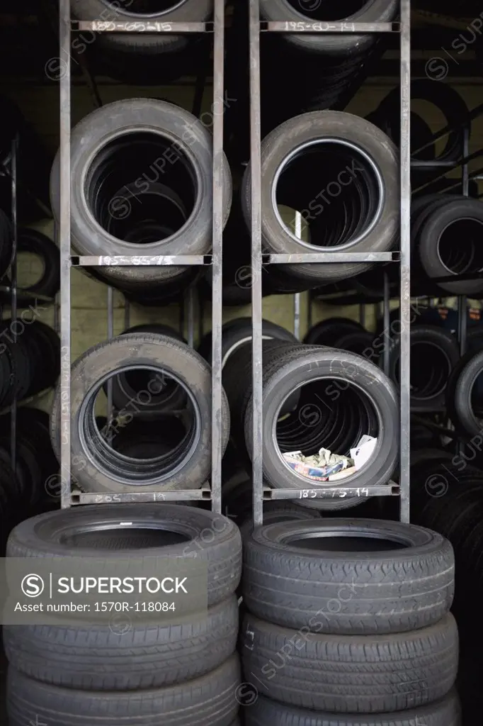 Tires stacked on shelves