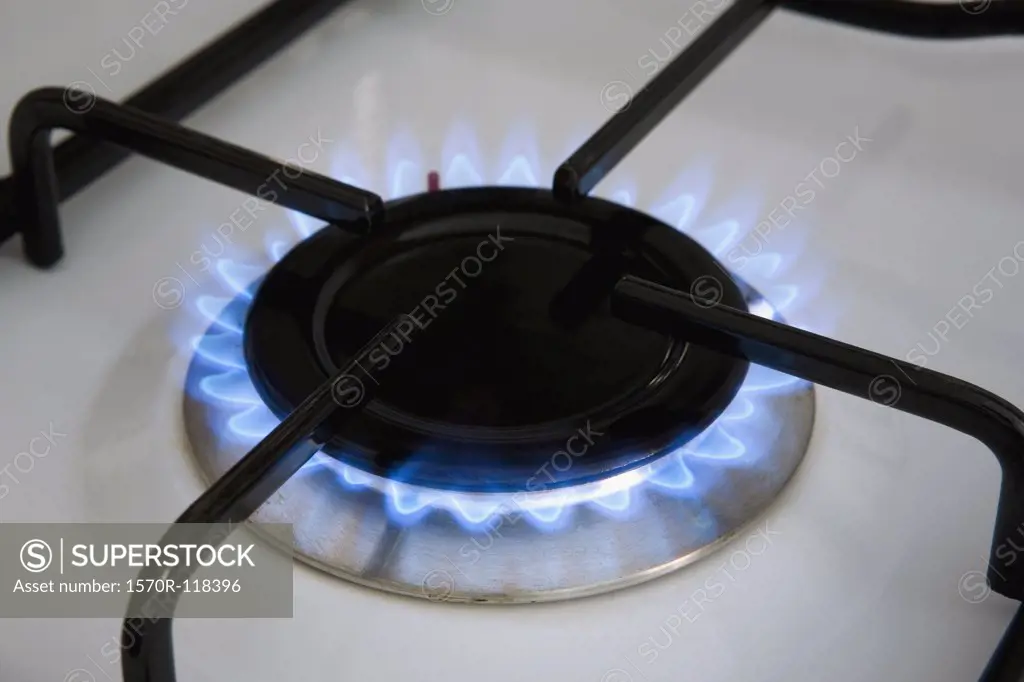 A blue flame from a gas oven