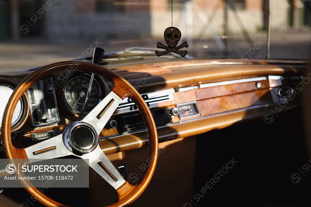 Steering wheel and dashboard of a vintage car