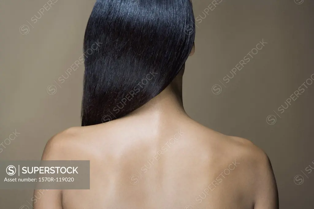 Rear View of a woman with long black hair