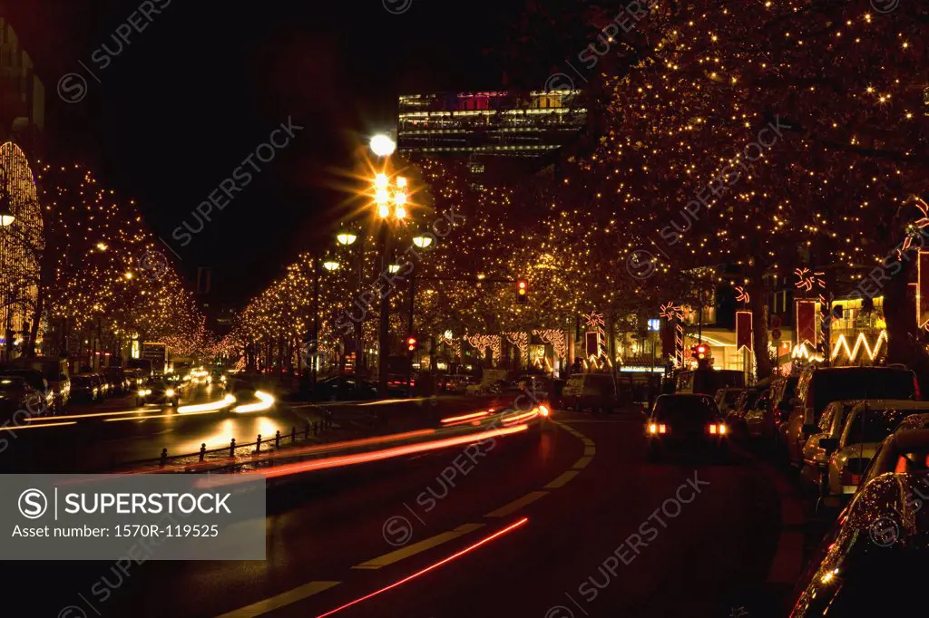 Rows of trees with Christmas lights along Kurfurstendamm, Berlin, Germany
