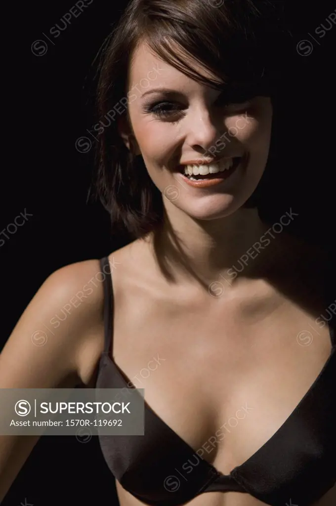 Portrait of a woman wearing a black bra