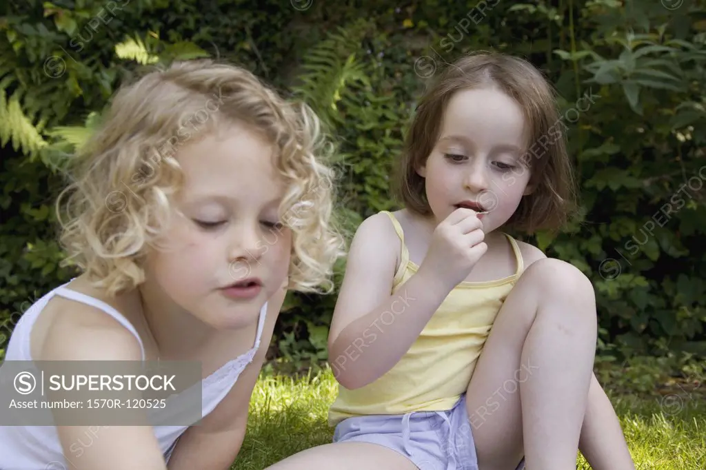 Two young girls at a picnic