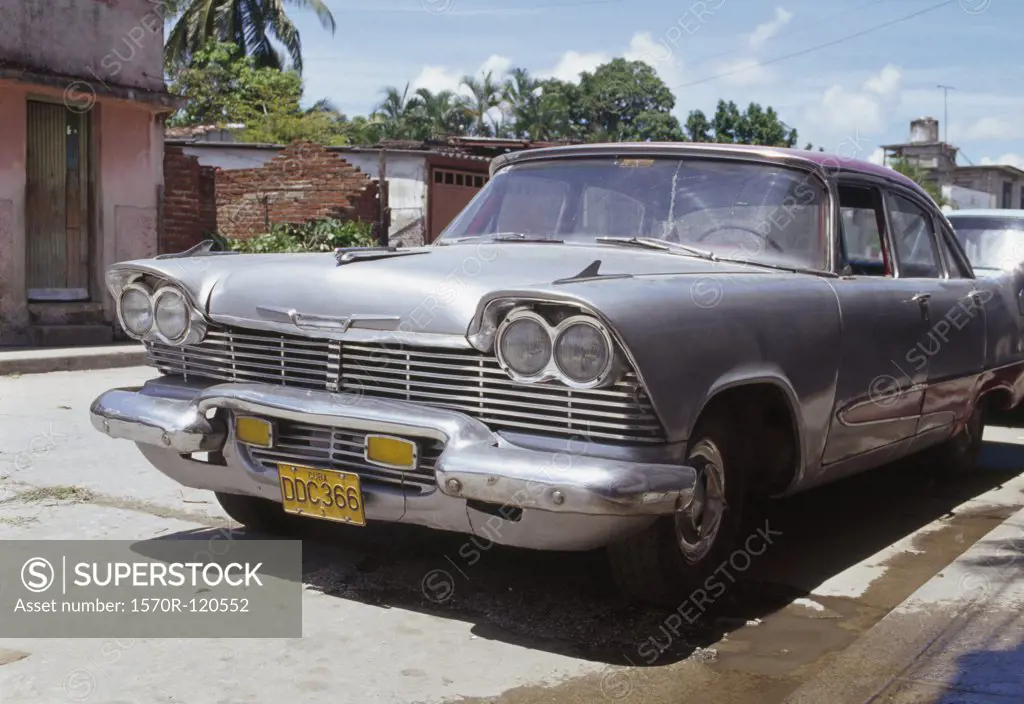 Vintage car parked on a street, Havana, Cuba