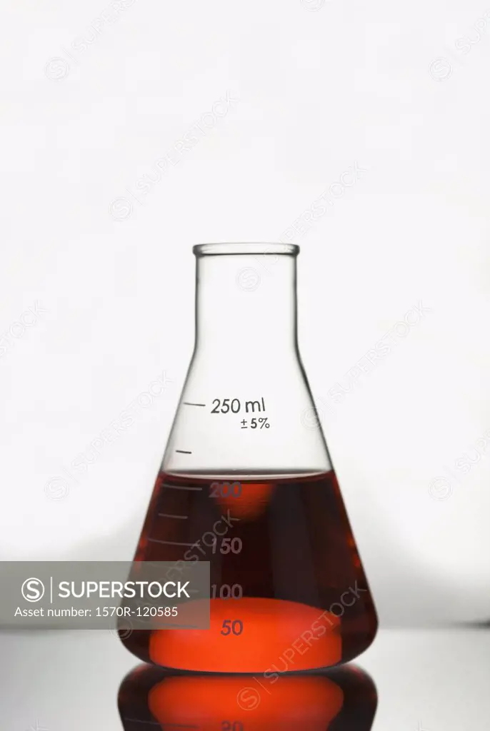 Red solution in a conical flask