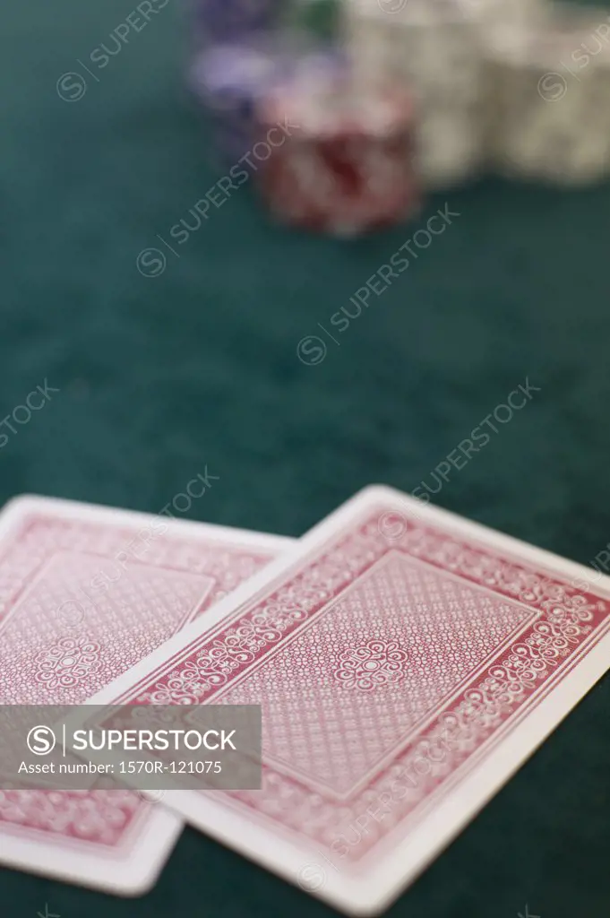 Two playing cards and piles of gambling chips on a table, Las Vegas, Nevada