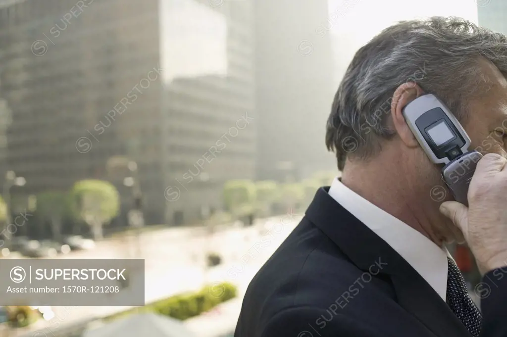 A businessman using a mobile phone