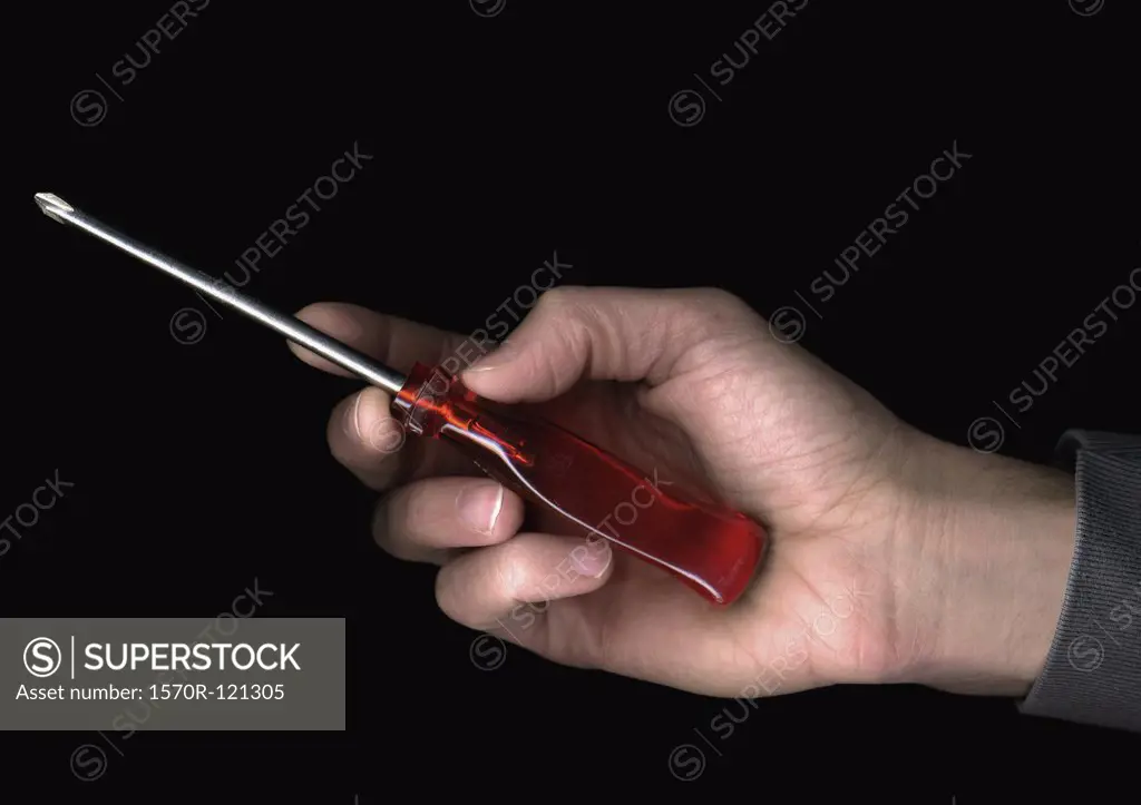Man holding a screwdriver