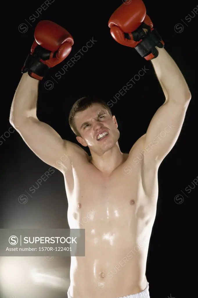 A boxer celebrating