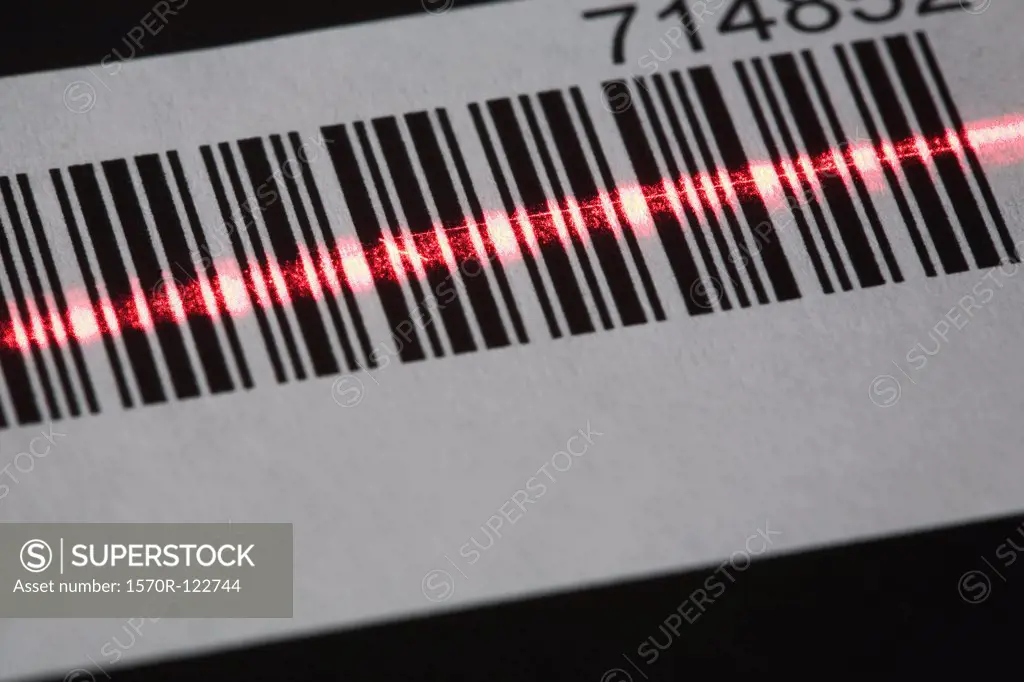 A laser reading a bar code