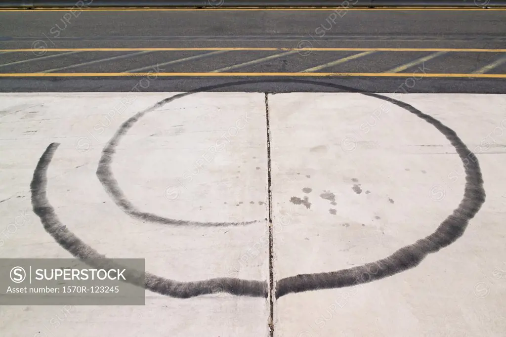 A single tire track in a spiral shape
