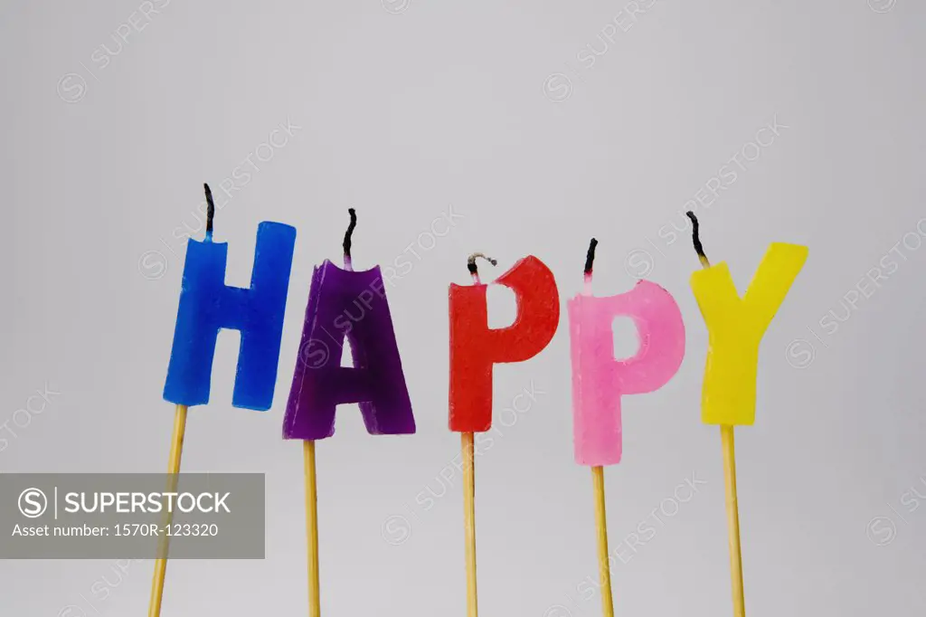 Candles spelling 'Happy'