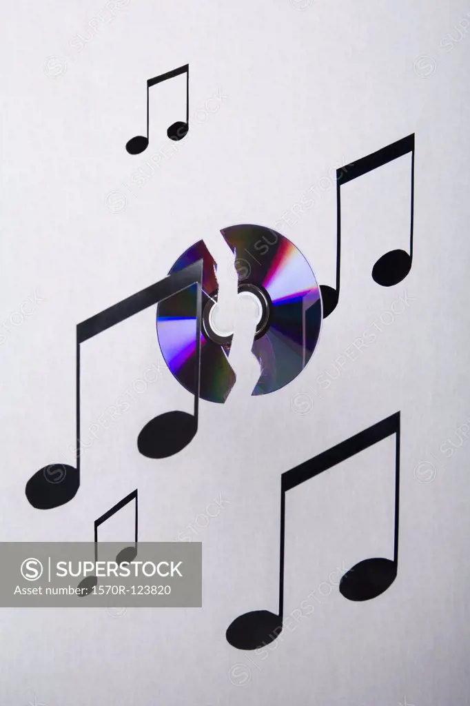 Musical notes and a CD suspended in mid-air