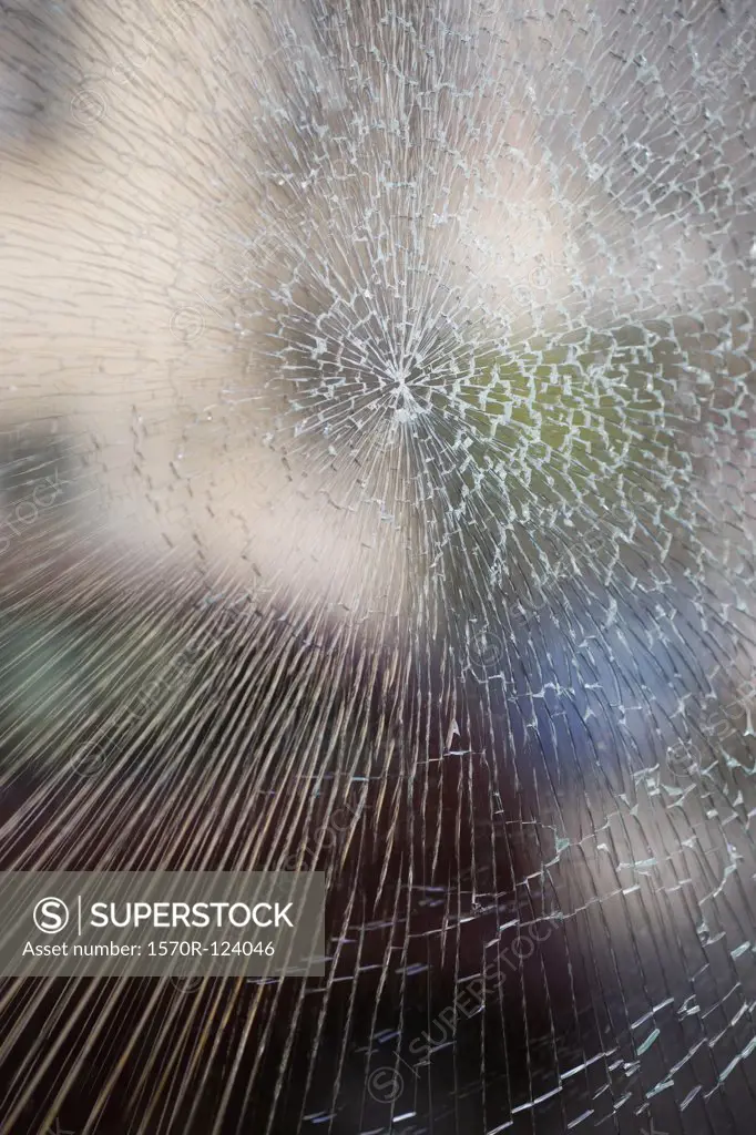 Extreme close up of a shattered window