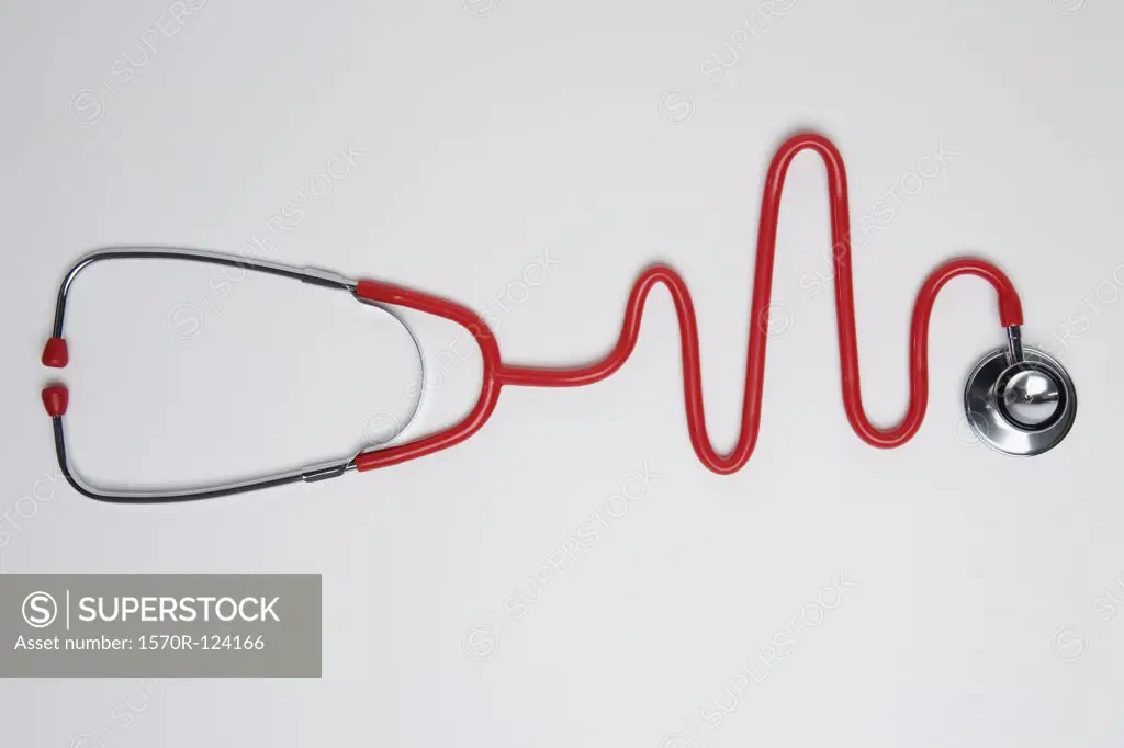 A stethoscope in the shape of a normal EKG graph