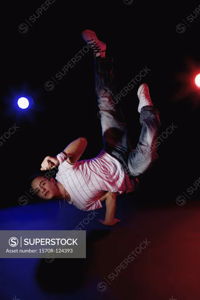 A B-boy doing a Pike Freeze breakdance move