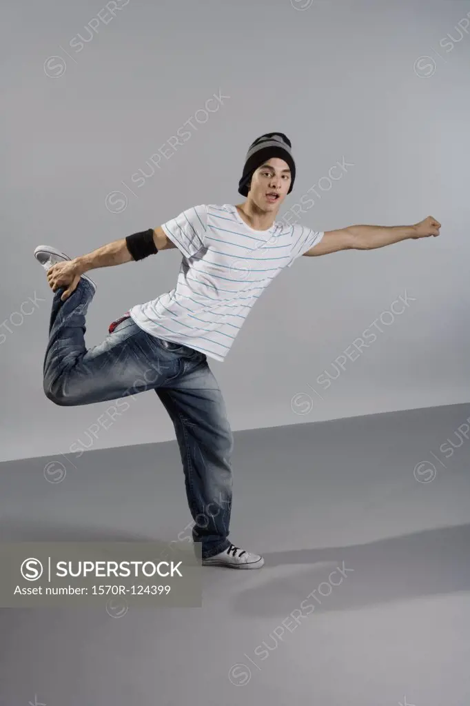 Portrait of a B-boy stretching
