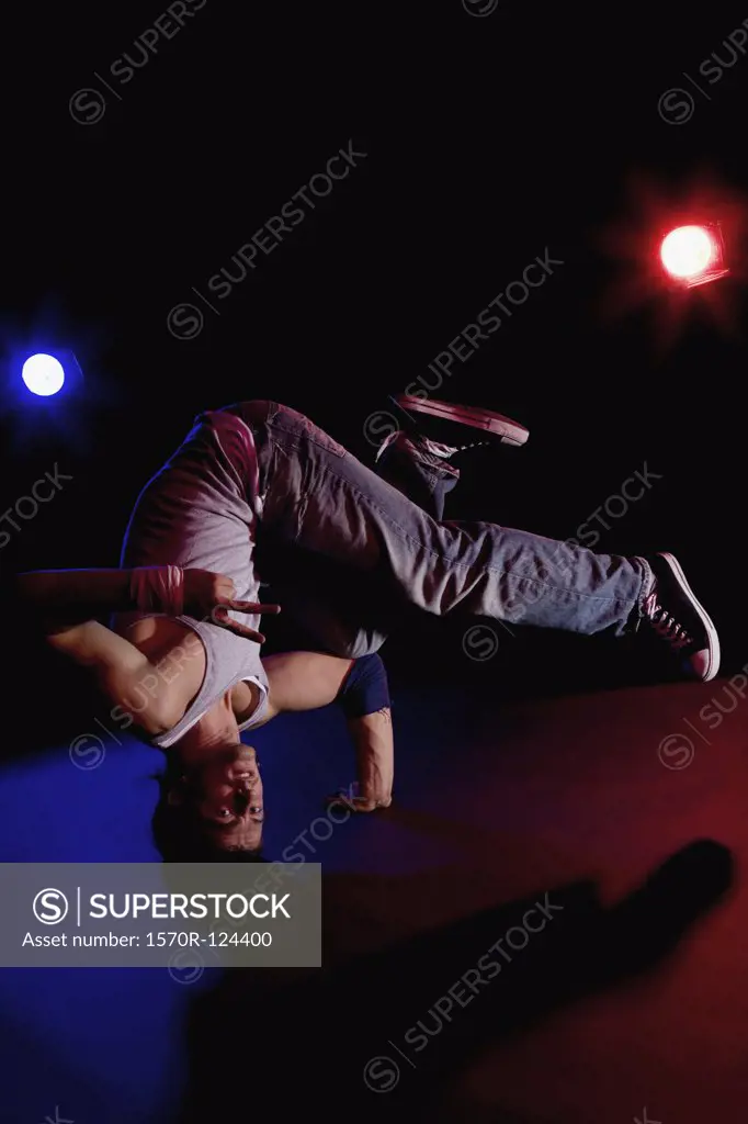 A B-boy doing a Headstand Freeze breakdance move