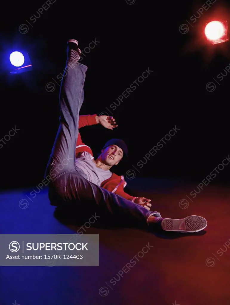 A B-boy doing a Freeze breakdance move