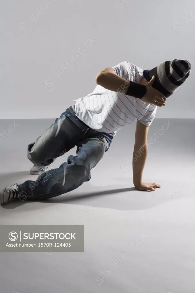 A B-boy trying to do a  breakdance move