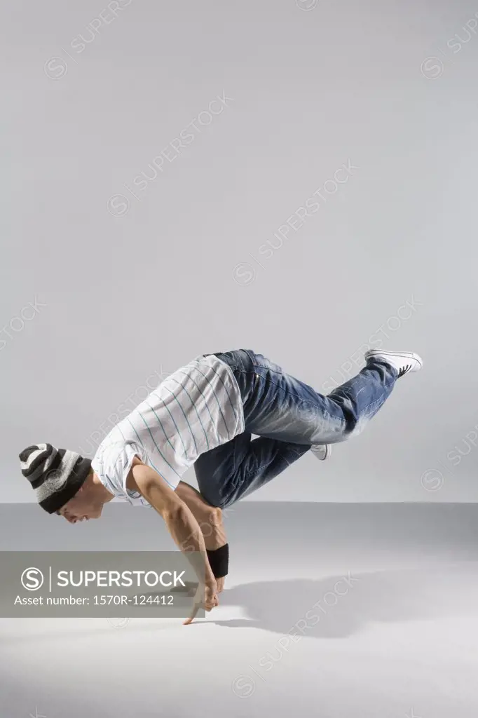 A B-boy doing an Airbaby  breakdance move