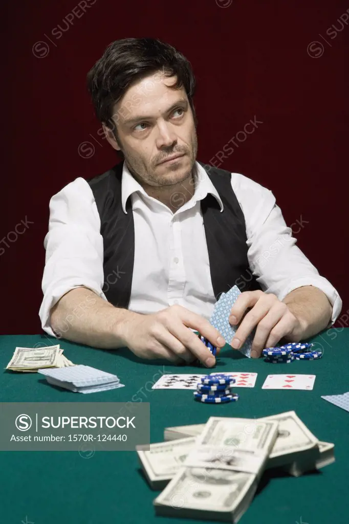 A man looking suspiciously at a high stakes poker game