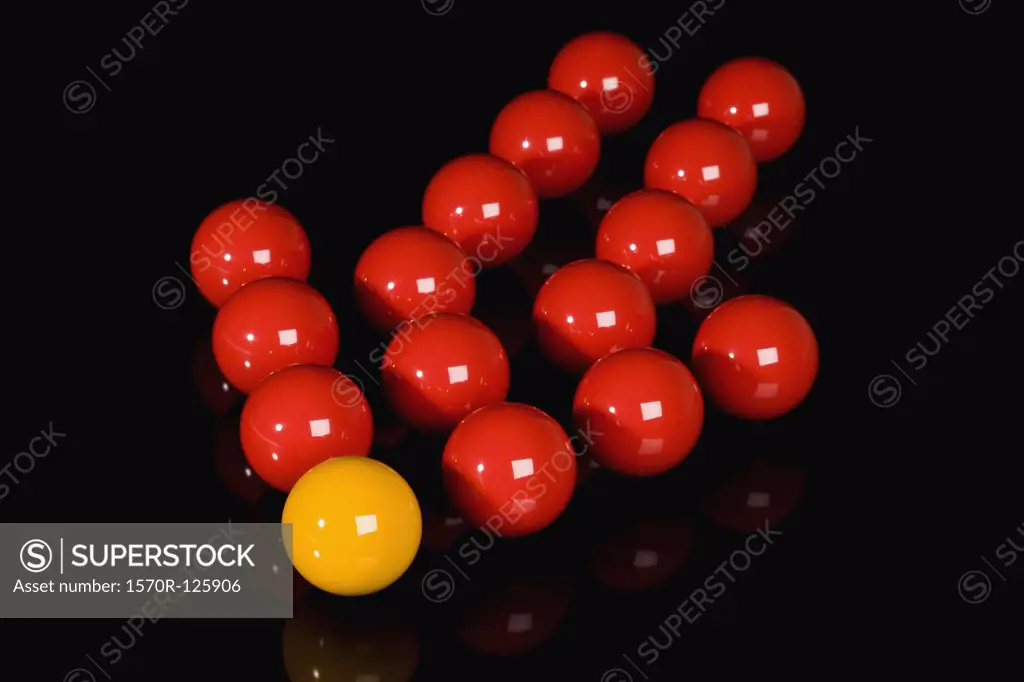 Snooker balls arranged into an arrow sign