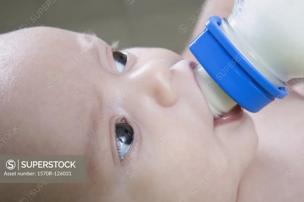 A baby drinking a bottle