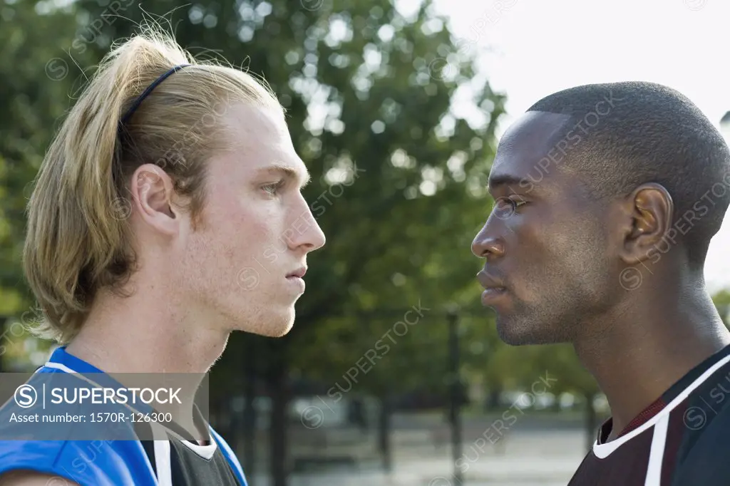 Two basketball players face to face