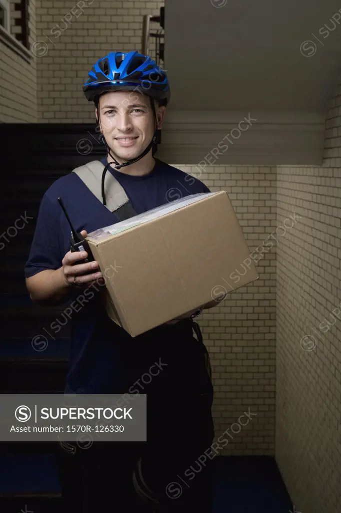 A bicycle messenger delivering a package