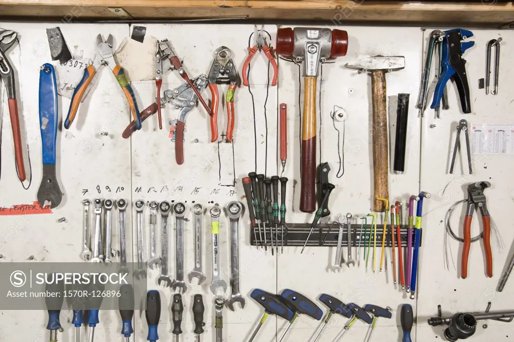 Hand tools arranged on a wall