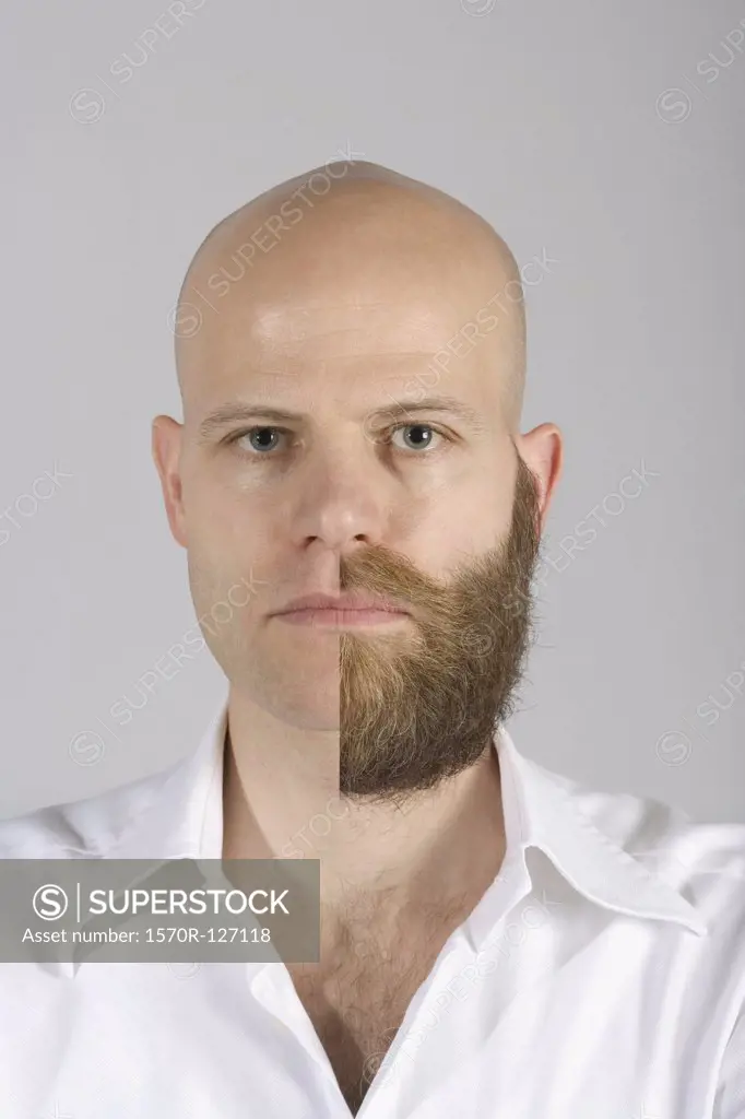 A man with a half shaven beard and mustache