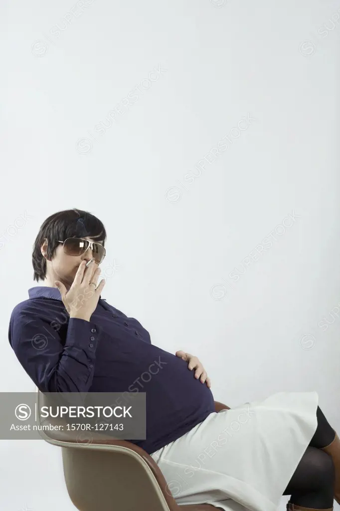 A pregnant woman smoking