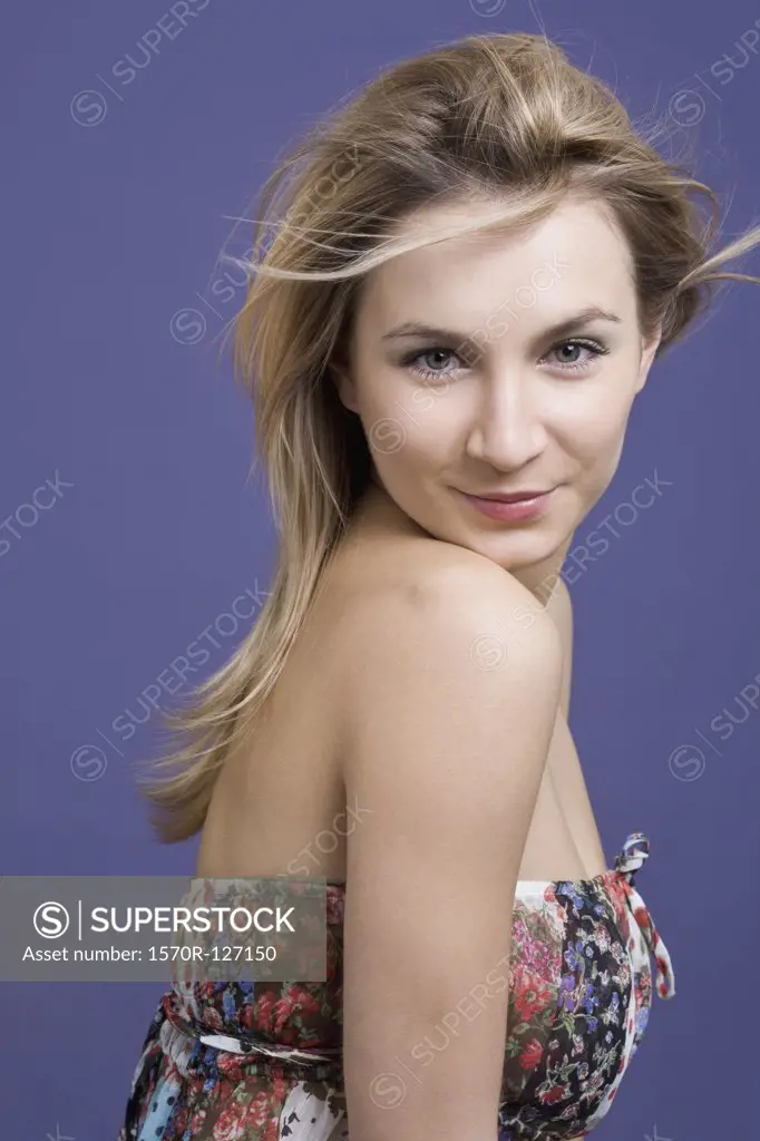 Young woman with blond hair smiling