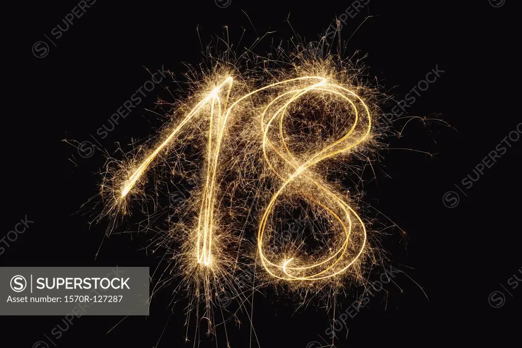 The number 18 written with a sparkler