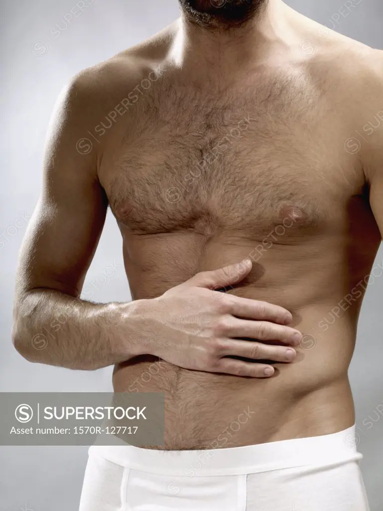 Midsection of a shirtless man